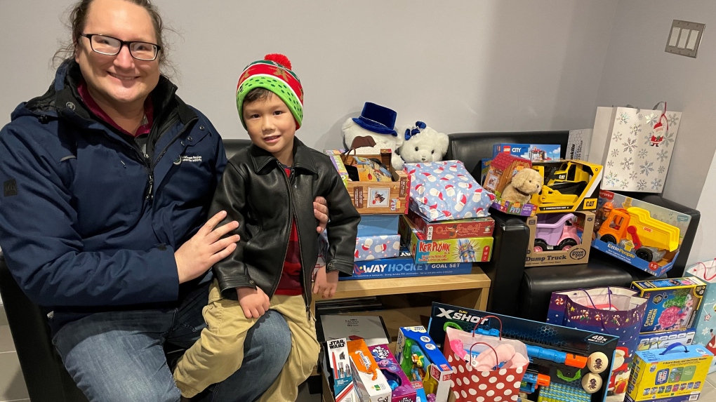 Henry, 4, and his dad Ken brought in all these Secret Santa gifts from the Lake Simcoe Region Conservation Authority Development Engineering and Restoration Department.