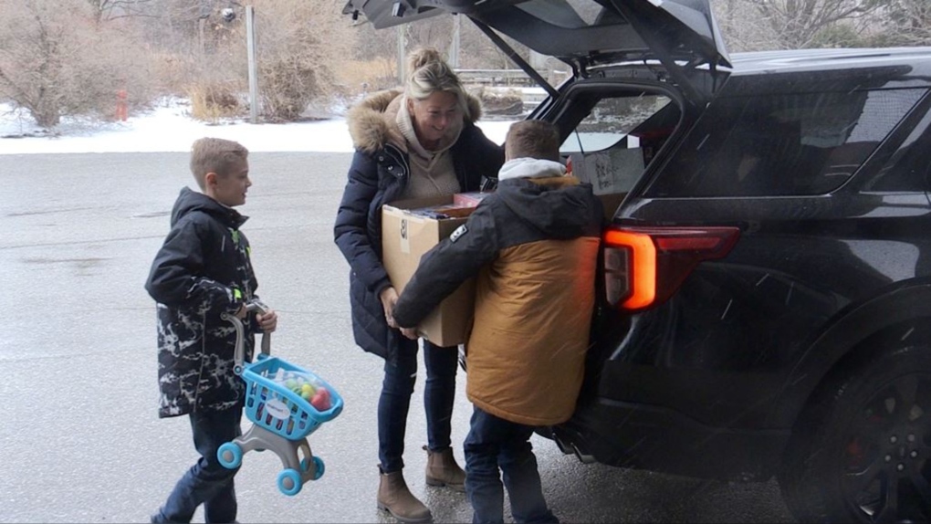 Laura Jackson from Kubota North came by the station with grandsons, Kellen, 12, and Ethan, 10, with all the toys donated in Muskoka for CTV’s Toy Mountain. 