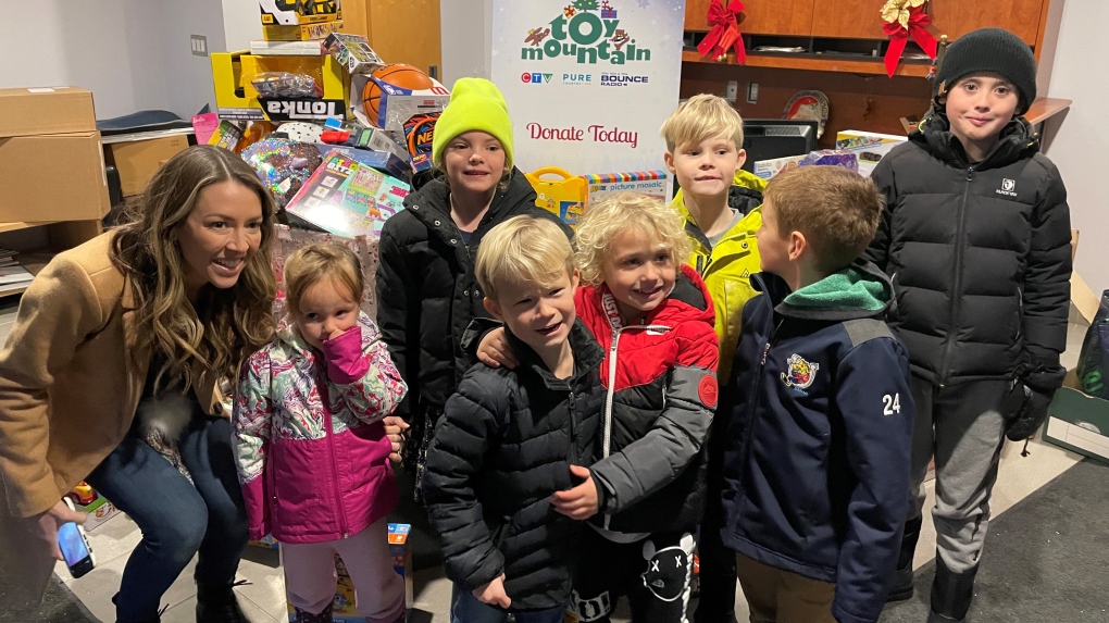 A group of seven Barrie families got together and surprised us with a big donation for Toy Mountain.