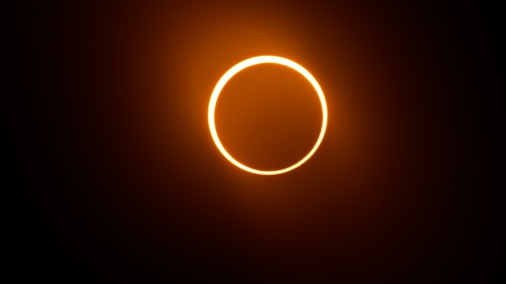The moon moves in front of the sun during an annular solar eclipse, or ring of fire, Saturday, Oct. 14, 2023, as seen from San Antonio. (AP Photo/Eric Gay)