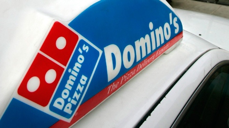 A Domino's Pizza delivery car is seen in this 2007 file photo. (AP / Douglas C. Pizac)