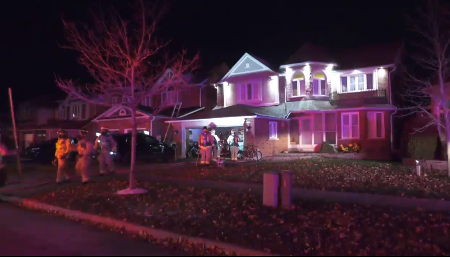 Barrie Fire and Emergency Services respond to a garage fire at a Barrie home on Cloughley Drive on Fri. Nov. 19, 2021 (Steve Mansbridge/CTV News Barrie)
