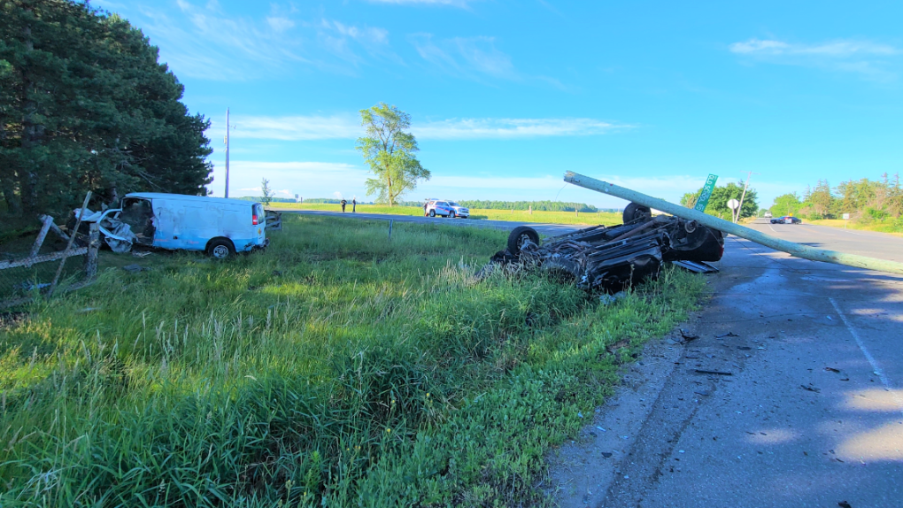 A white work van and black pickup truck were involved in a serious collision in Caledon, Ont. on Wed. June 23, 2021, that sent three to hospital. (OPP)