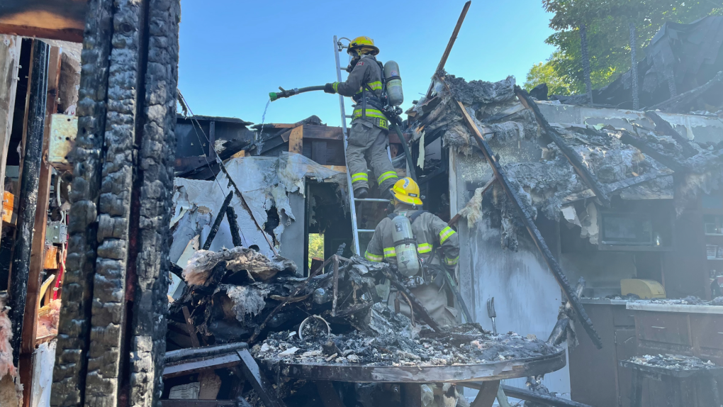 Firefighters battle a home in Meaford, Ont. on Wednesday, June 22, 2022 (Courtesy of Meaford Fire)