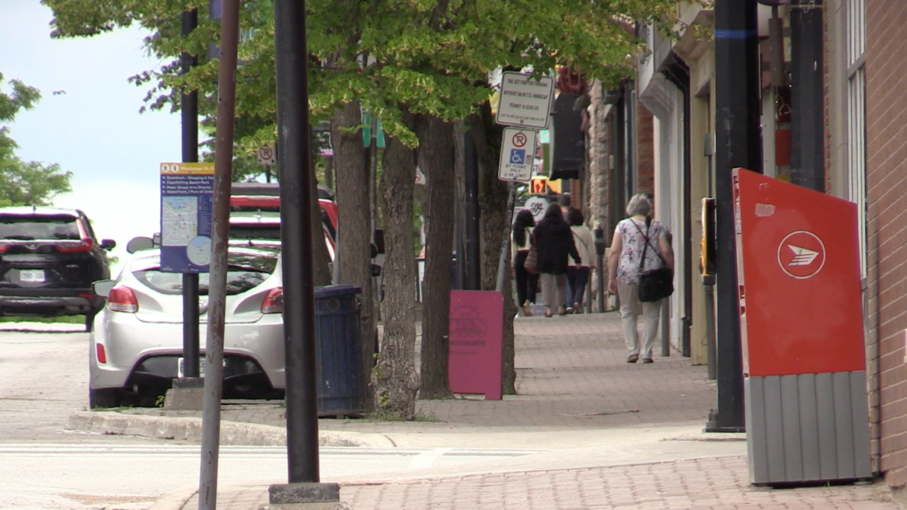 Pedestrians walk the streets of downtown Orillia, Ont. along Mississaga Street West. (CTV News/Mike Arsalides)