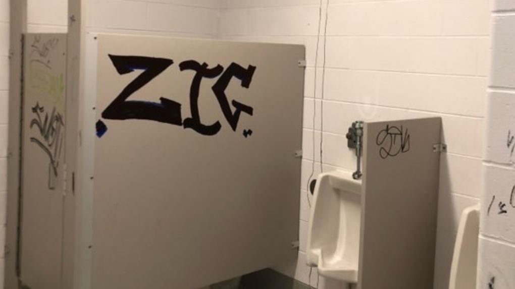 Graffiti on a bathroom stall in Bracebridge, Ont. (OPP/Supplied)