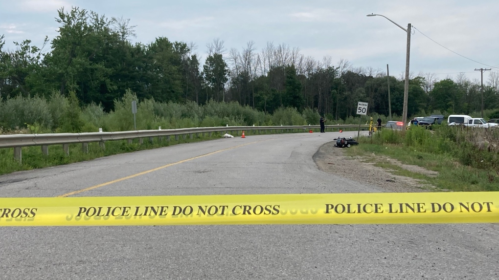 Police investigate a deadly motorcycle crash on Canal Road in Bradford West Gwillimbury, Ont., on Wed., July 27, 2022. (CTV News/Amanda Hicks)