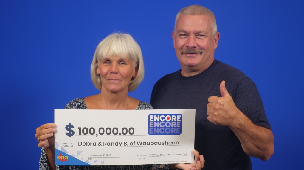 Debra and Randy Barnes, both 58, of Waubaushene, Ont., collect their winnings at the OLG Prize Centre in Toronto, Ont. (Supplied)