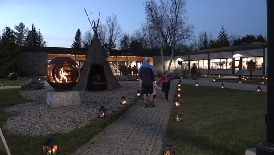 People attend the first night of the 23rd annual First Light event at Sainte-Marie among the Huron on Thurs. Nov. 16, 2023 (CTV News/Chris Garry). 