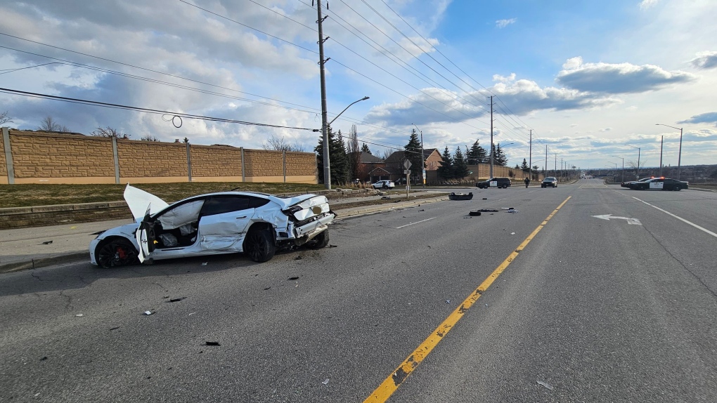 Police attend the scene of a two-vehicle collision on Mayfield Road in Caledon, Ont., on Tues., March 28, 2023. (OPP/Twitter)