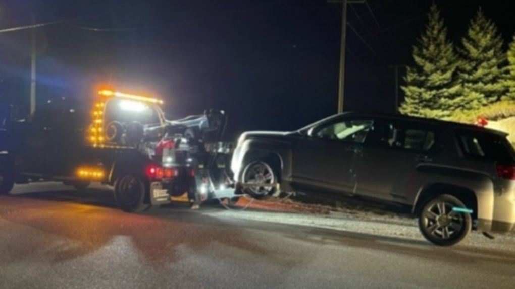 A driver's SUV was towed by police after he was charged with a variety of driving offences. (Source: OPP)