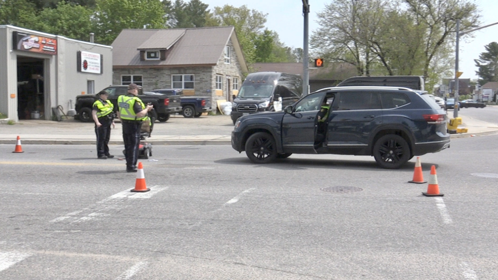 Police closed a section of Winewood Avenue in Gravenhurst, Ont., on Fri., May 19, 2023, for a collision investigation involving a mobility scooter and SUV. (CTV News/Steve Mansbridge) 