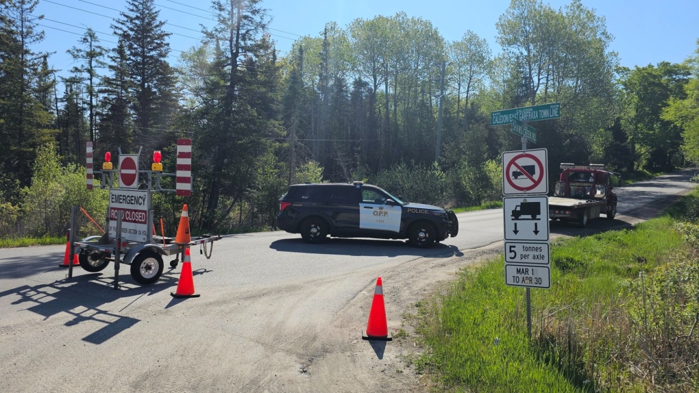 Police close a road in Caledon for a fatal collision investigation on Mon., May 29, 2023. (OPP)
