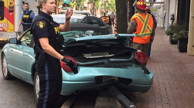 Car into light post